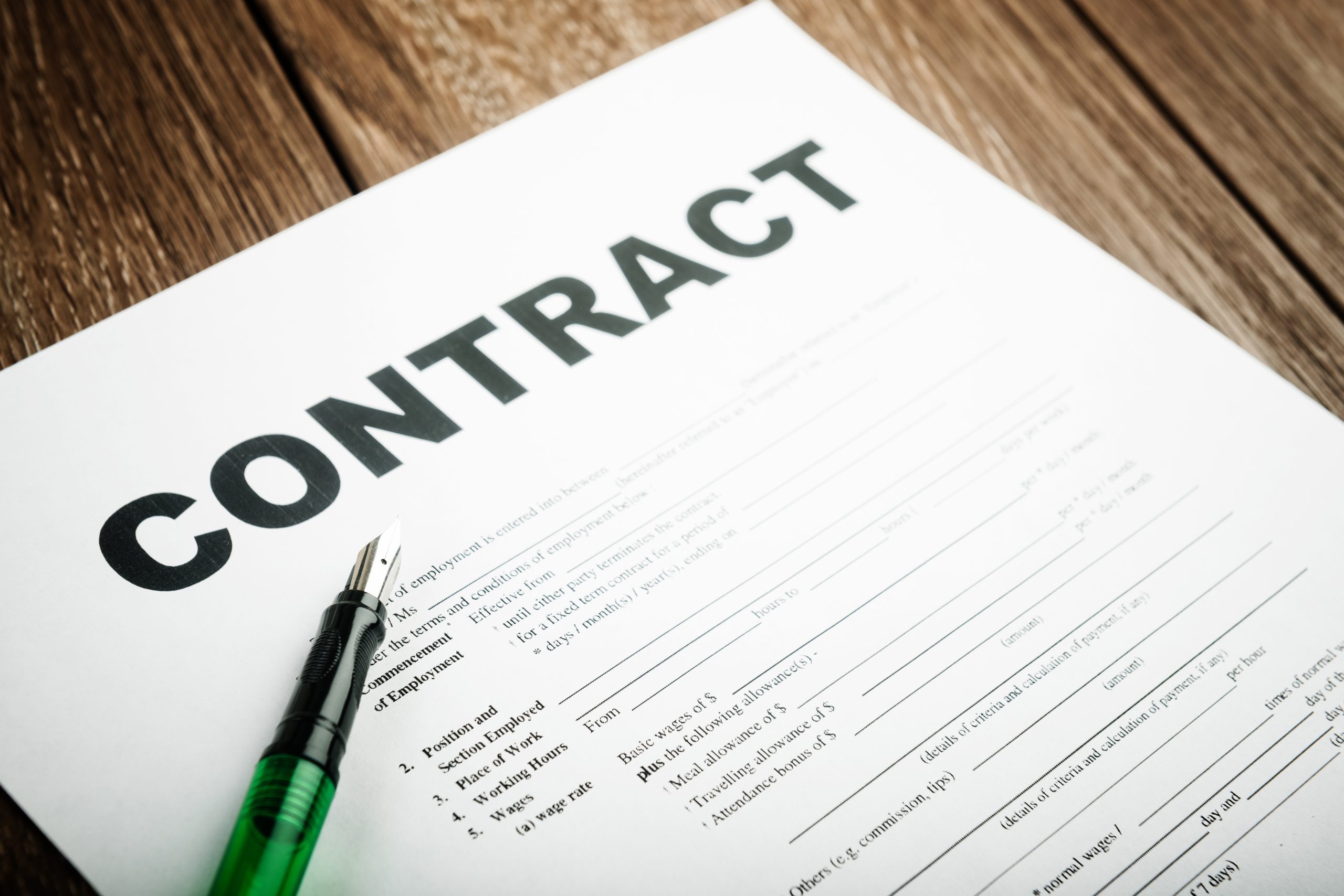 Paper contract on table